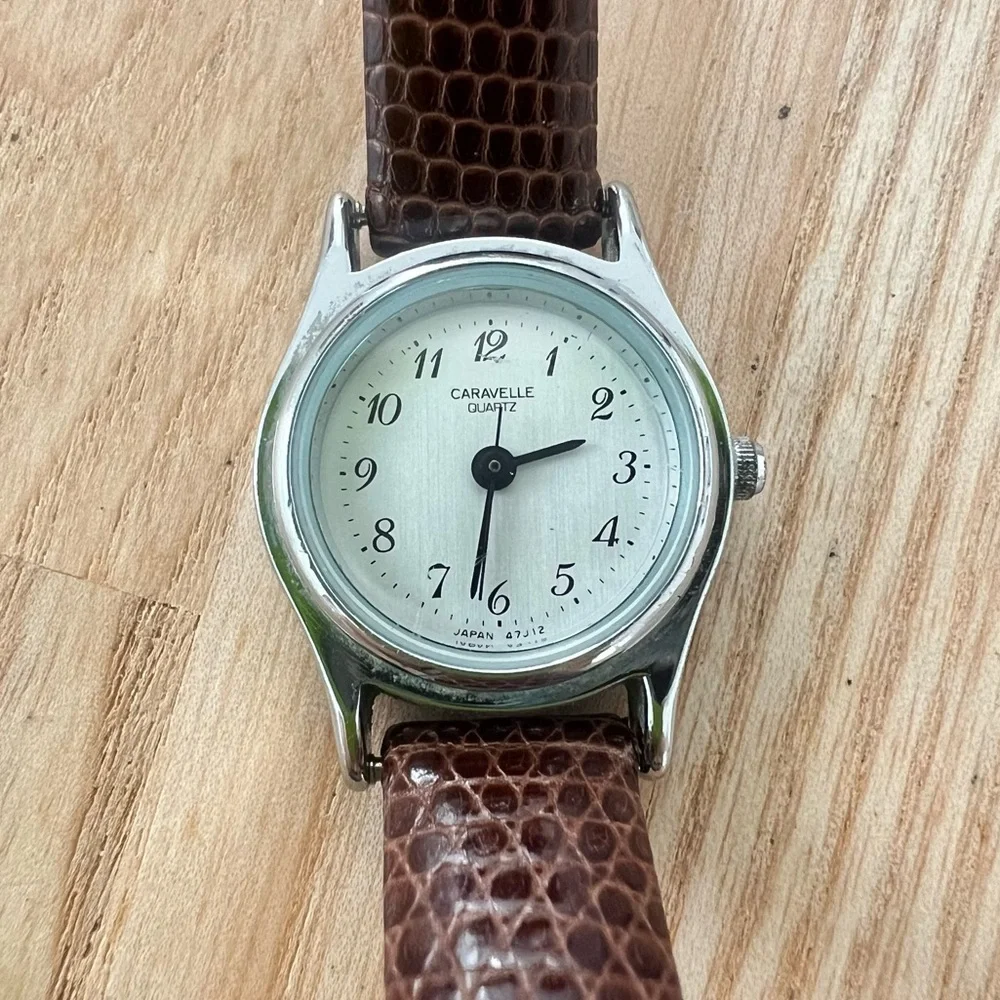 Caravelle by Bulova ladies silver tone brown leather dress watch NEW BATTERY